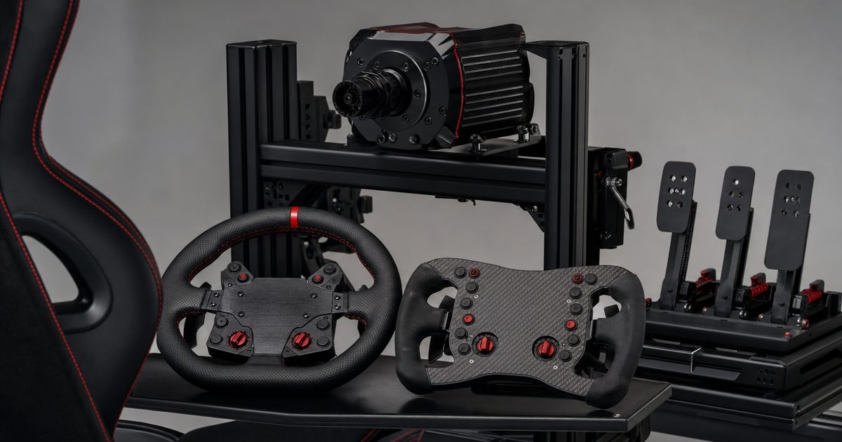 A close-up of a sim racing steering wheel rim showing buttons and a quick release.